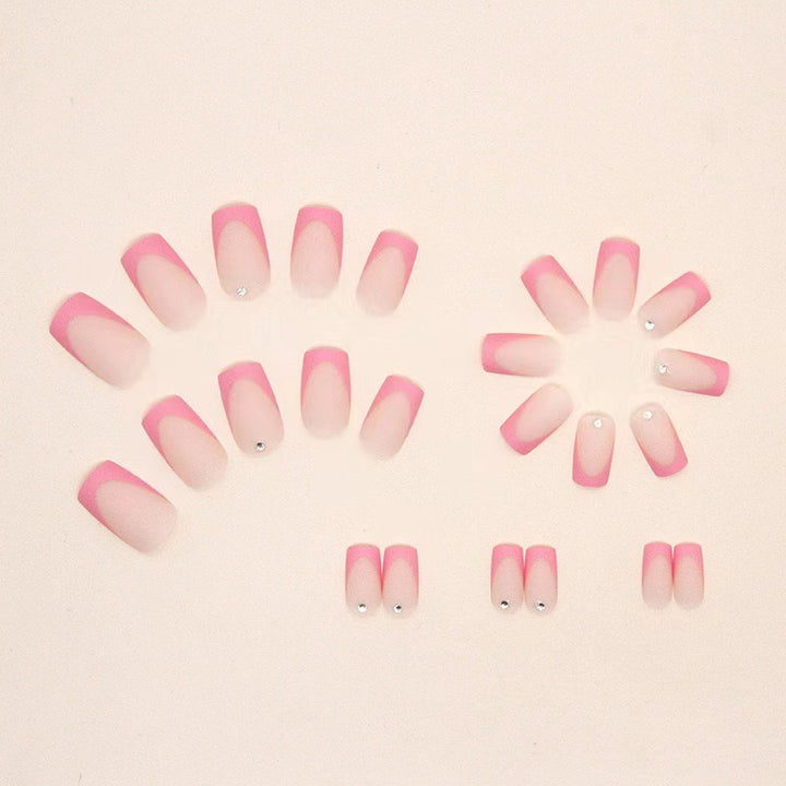 Nail set with elegant French design and glitter accents Bowlift