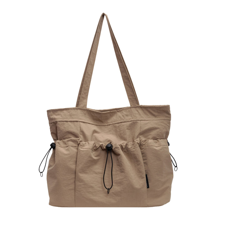 Practical everyday handbag with drawstring Bowlift