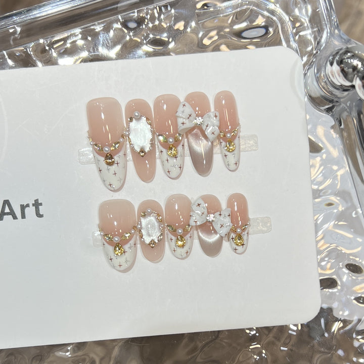 Elegant Stiletto Press-On Nail Set with Decorative Accents Bowlift