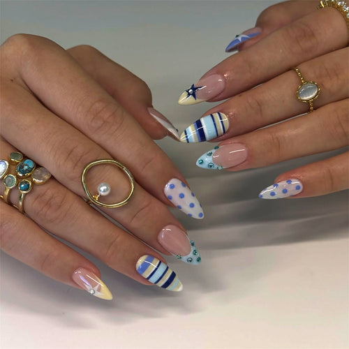 Artful stiletto nails with maritime designs Bowlift