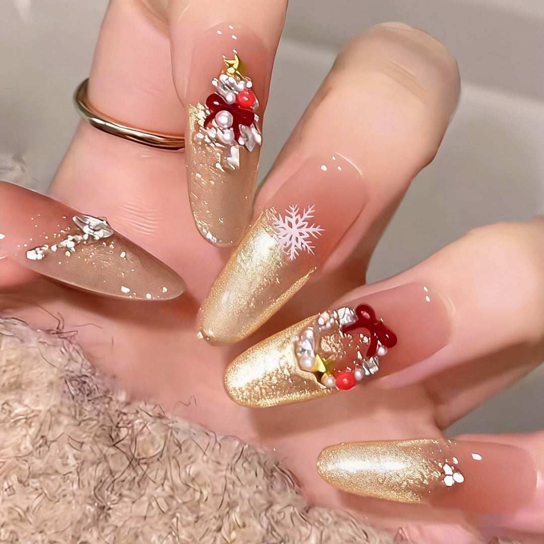 Artificial nail set with festive gift design and elegant glitter accents Bowlift