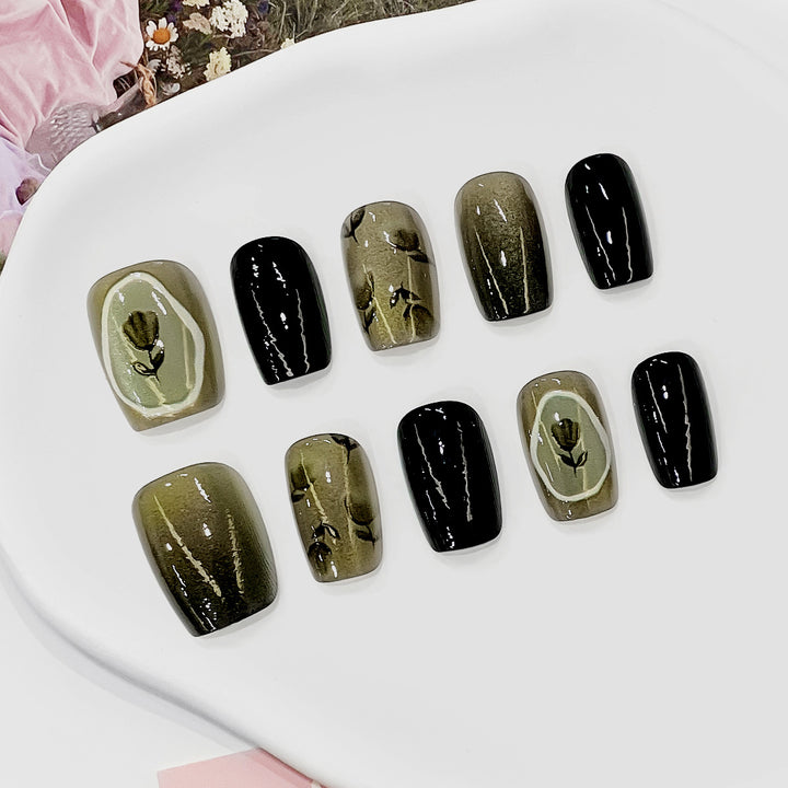 Artistic acrylic nails with floral designs Bowlift