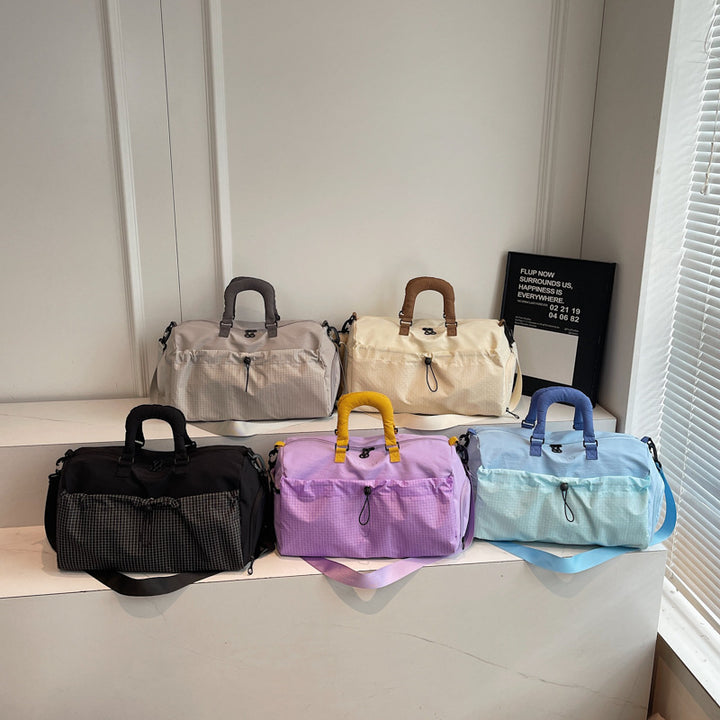 Sporty travel bag with padded carrying handle Bowlift