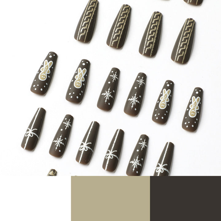 Artificial nail art with festive gingerbread design Bowlift