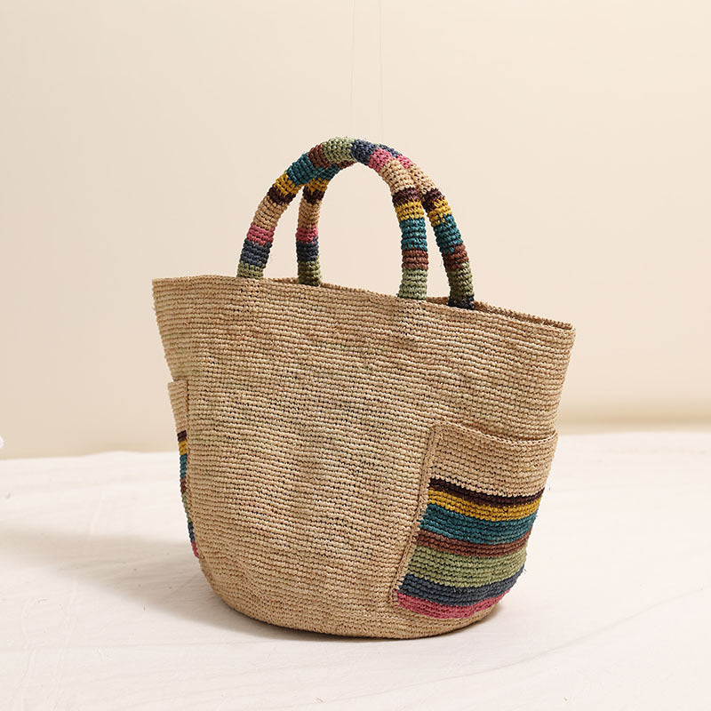 Handcrafted basket bag with colorful stripe accents Bowlift