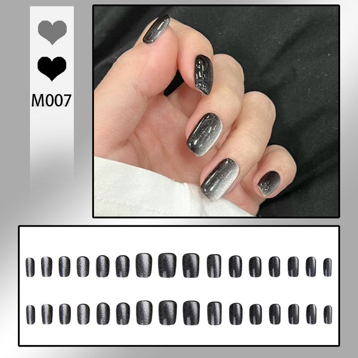 Artifical nail set with glamorous ombre effect and glitter embellishments Bowlift