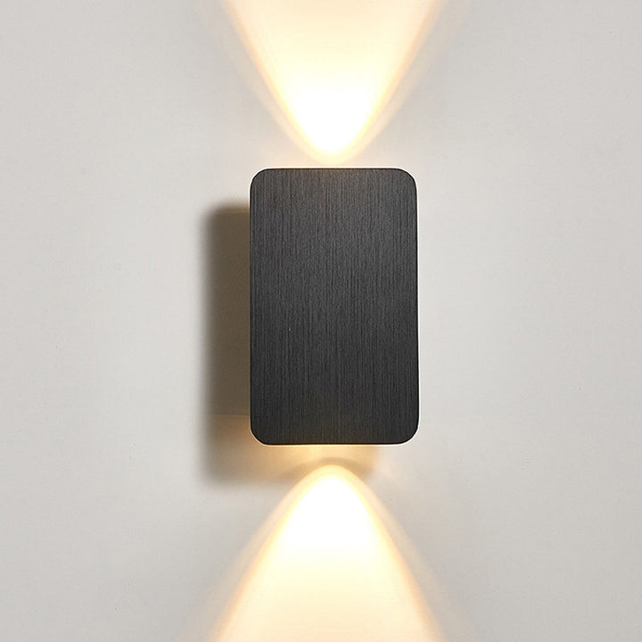 Modern rectangular LED wall sconce with dual up down beam and slim low-profile housing Bowlift