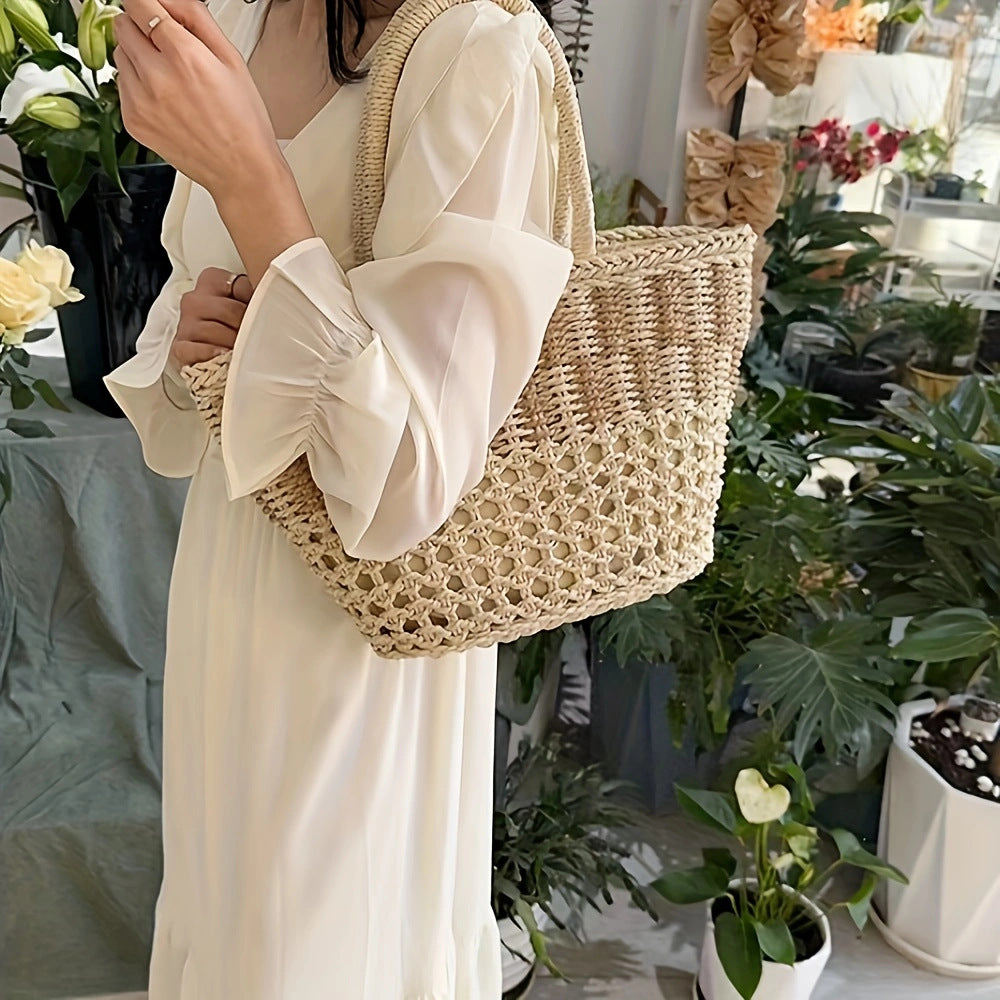 Handwoven basket bag with airy structure Bowlift