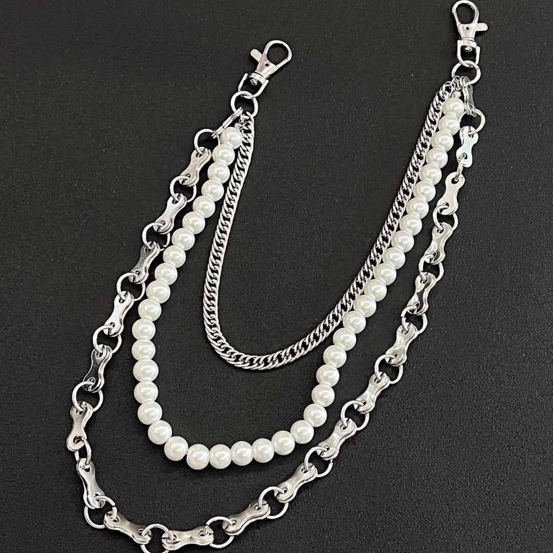 Fashionable chain bracelet with pearls and metal links Bowlift