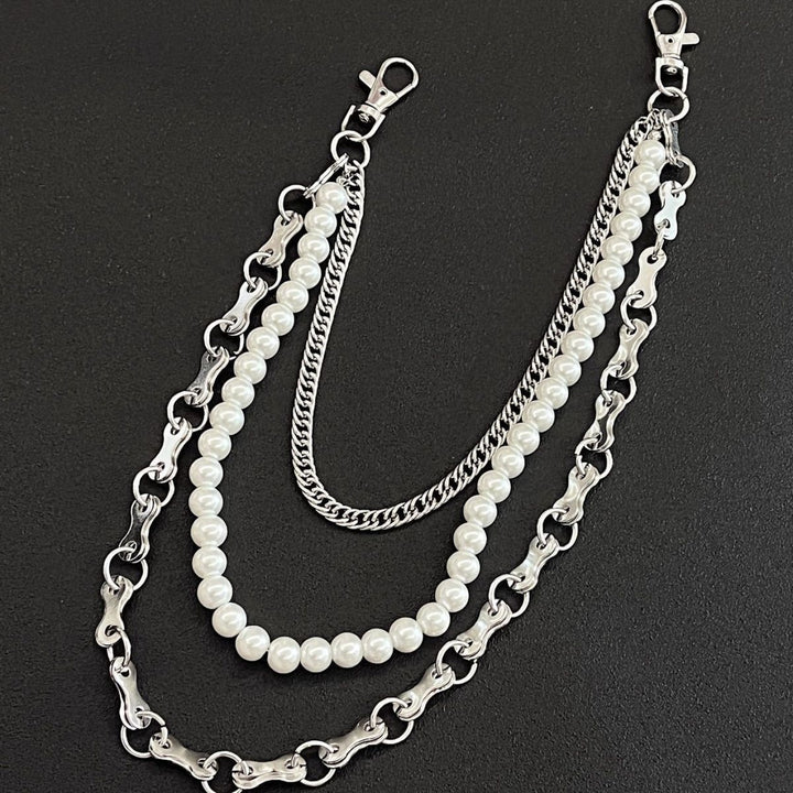 Fashionable chain bracelet with pearls and metal links Bowlift