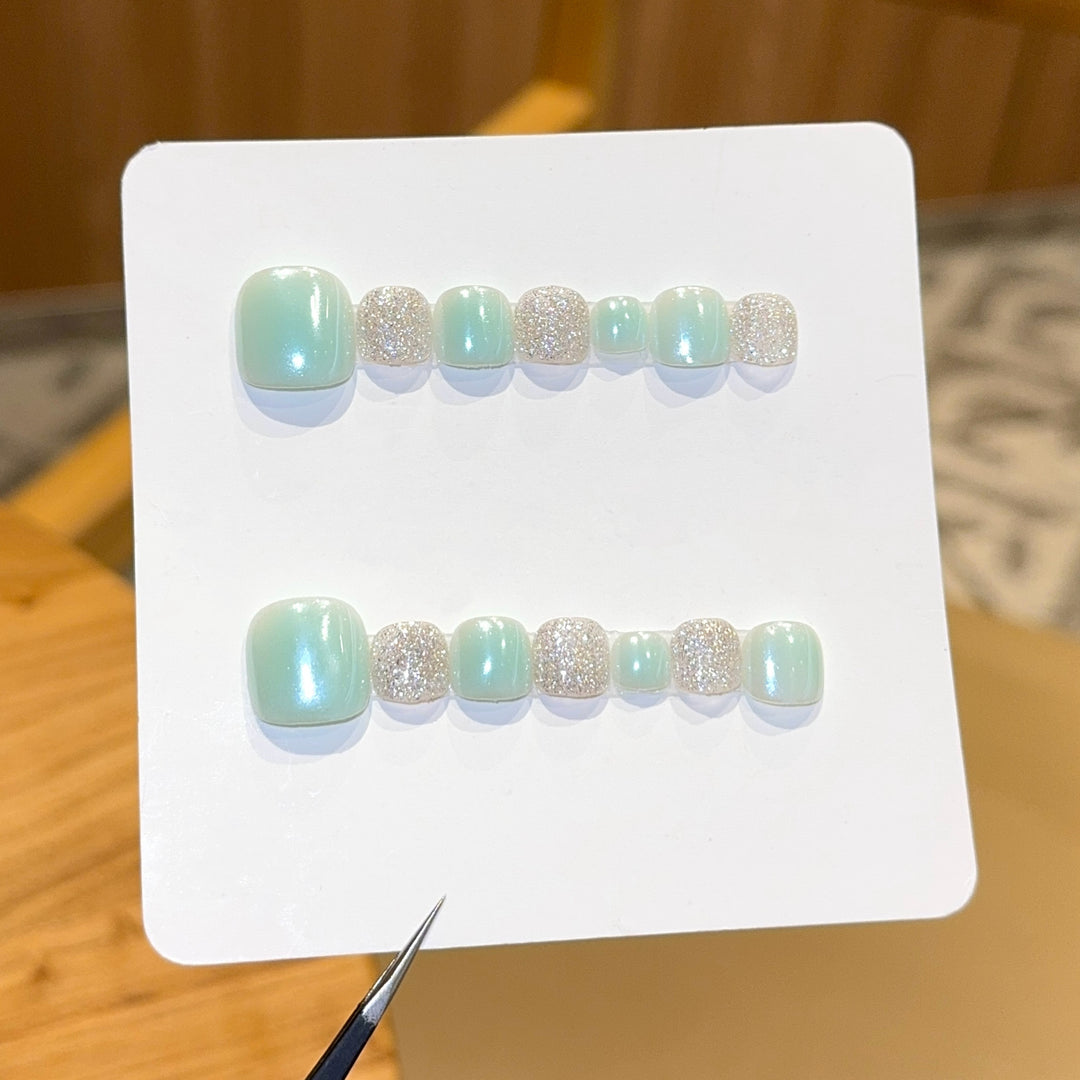 Acrylic nail set with glitter and pastel accent Bowlift