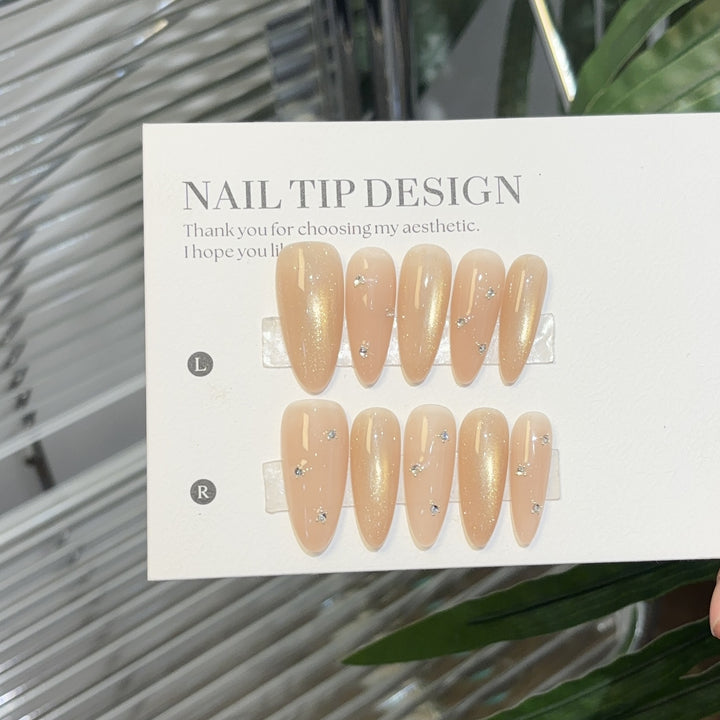 Elegant artificial nails with glitter accents Bowlift