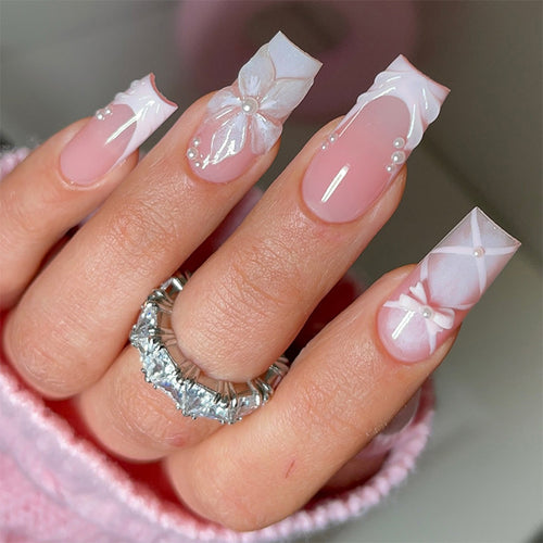 Artificial nail sets with elegant floral accents Bowlift
