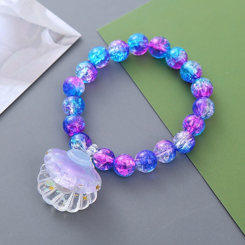 Playful bracelet with shell pendant Bowlift
