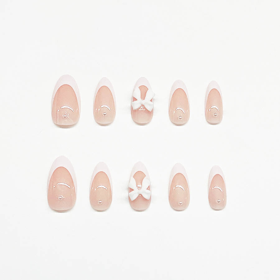 Artificial nail set with luxurious 3D bow decorations Bowlift