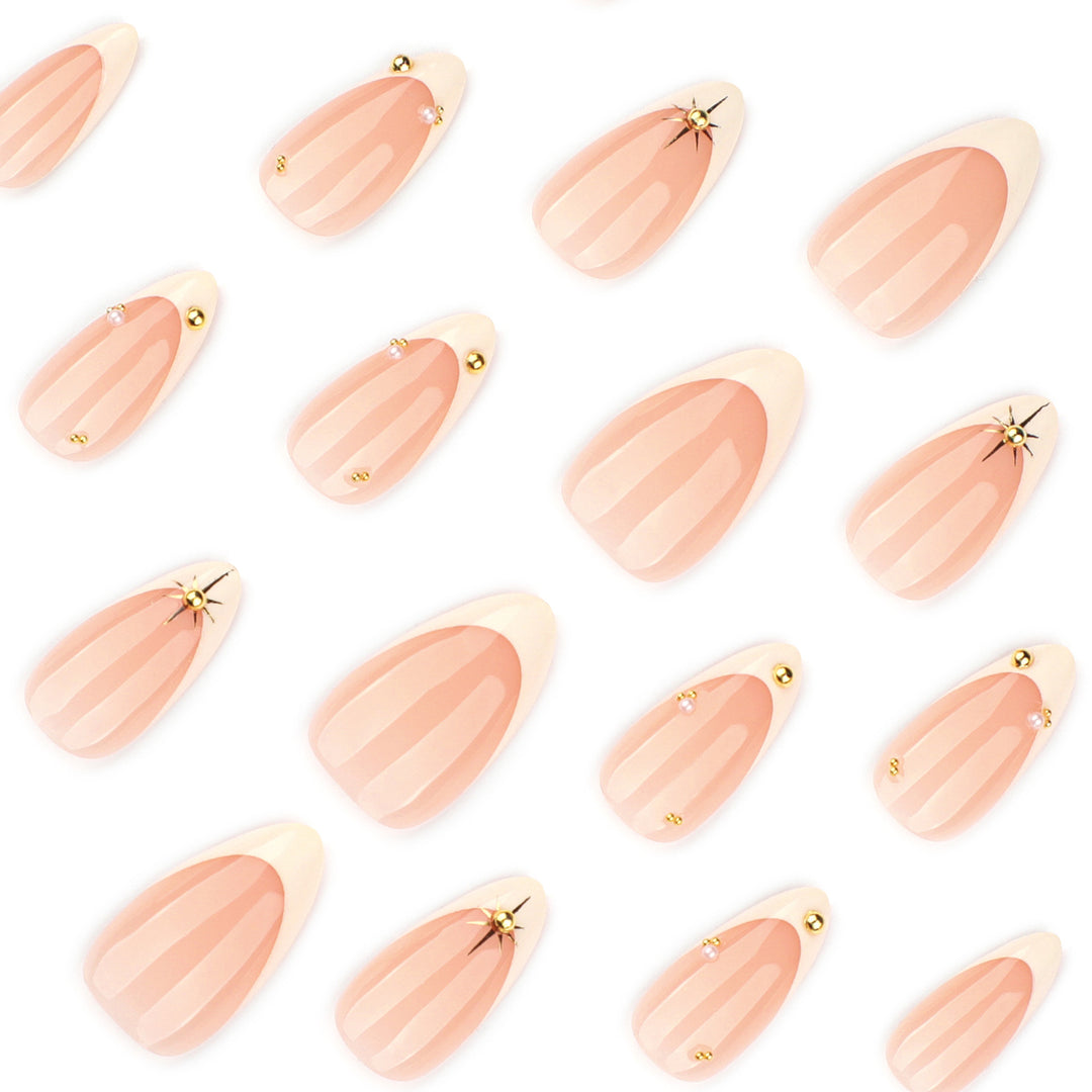 Artistic French-tip nail art with glitter and elegant embellishments Bowlift