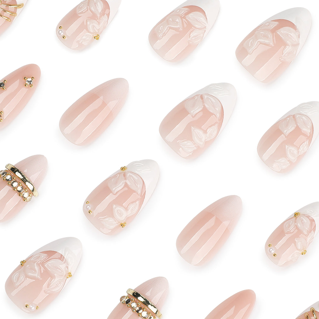 Artful nail art with floral and rhinestone accents Bowlift