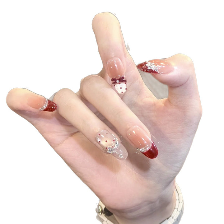 Artificial nails with glitter and tip accents Bowlift