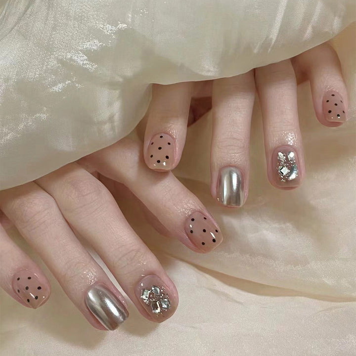 Artificial nail extensions with elegant accent decoration Bowlift