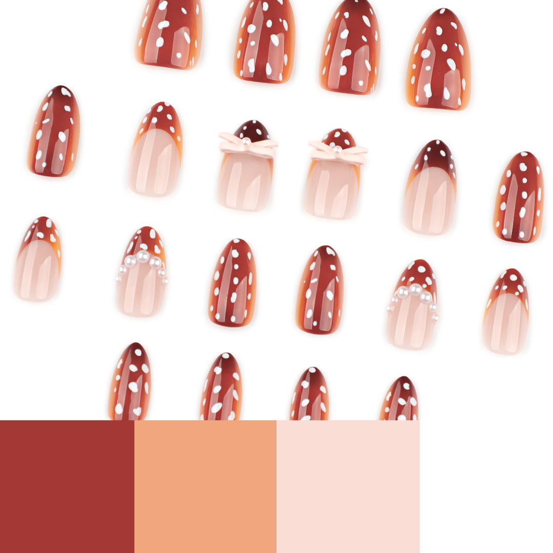 Artificial nail art with dot pattern and bow accents Bowlift