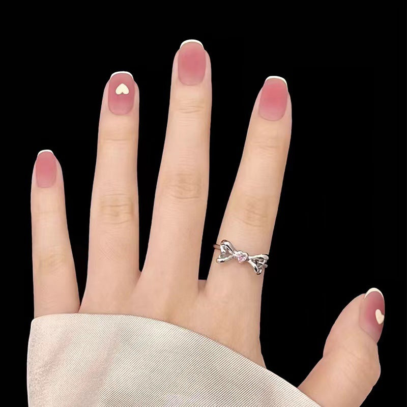 Creative nail designs with heart accent Bowlift