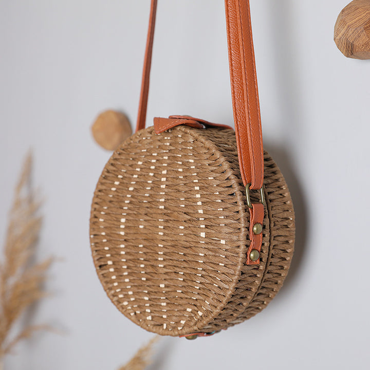 Round basket bag with leather accents Bowlift