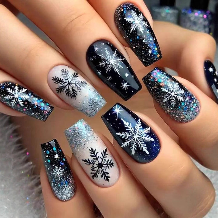 Nail art set with sparkling snowflakes and glitter accents Bowlift