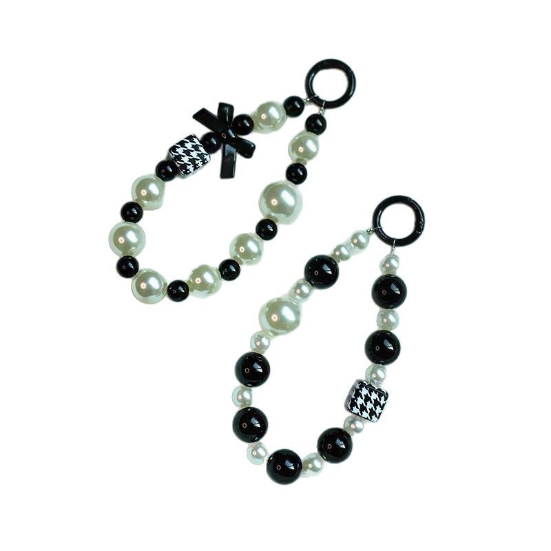 Elegant Pearl and Black Bead Charm Bracelet Bowlift