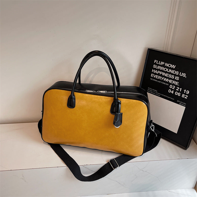 Elegant and Spacious Travel Bag Made of Faux Leather Bowlift