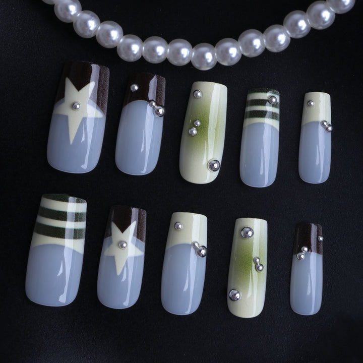 Artificial nails with unique geometric design Bowlift