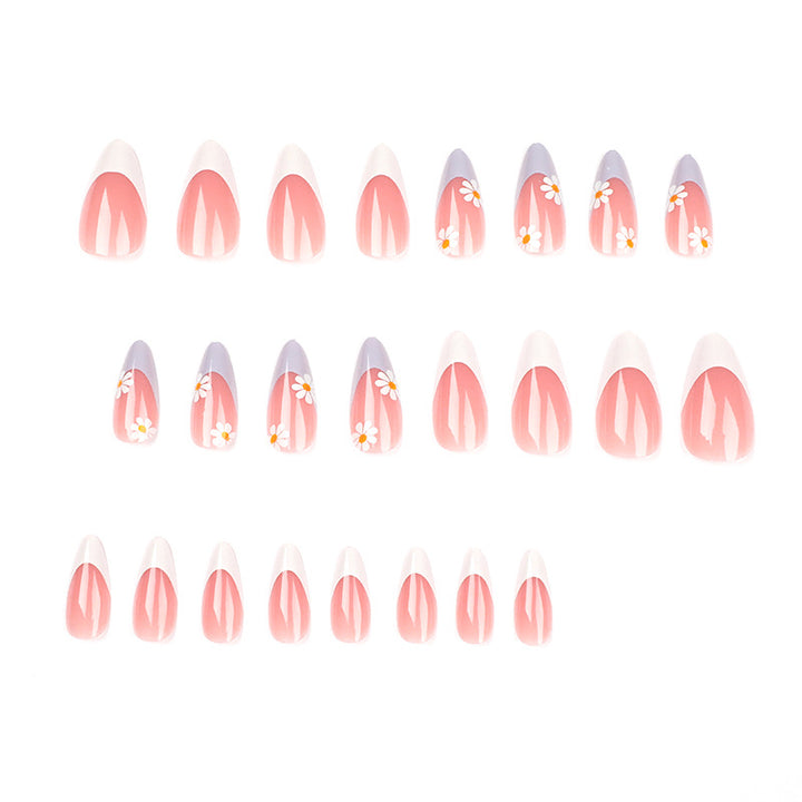 Elegant artificial nail design with delicate flower and ombre effects Bowlift