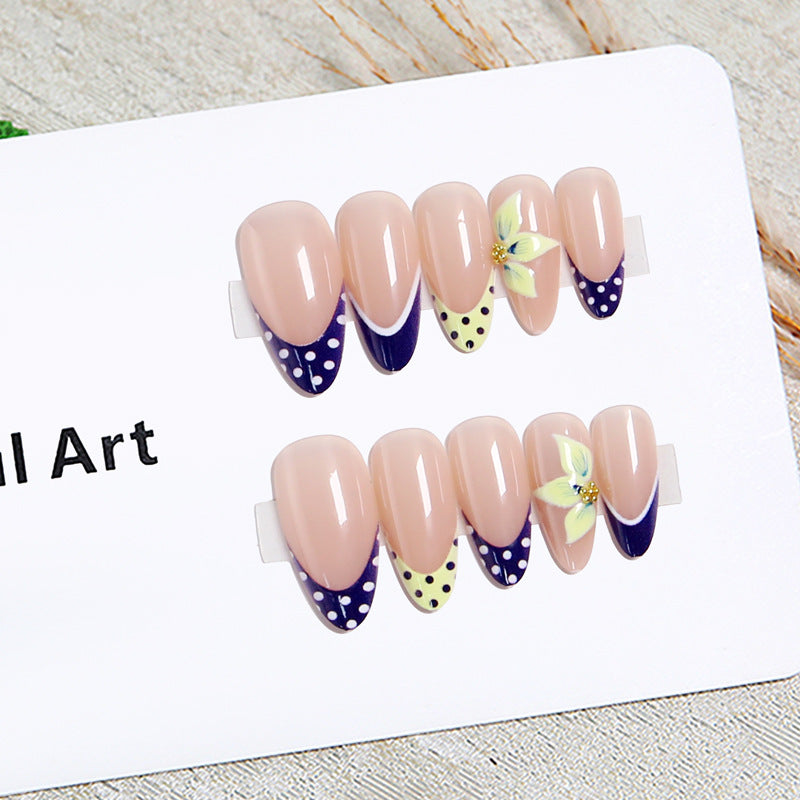 Artful nail tips with floral accent Bowlift