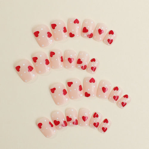 Artificial nail set with romantic heart motifs and shimmering accents Bowlift