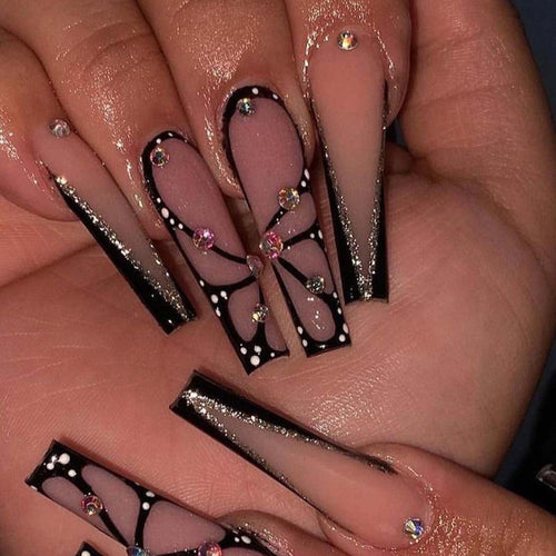 Artful stiletto artificial nails with glitter and butterfly motif Bowlift