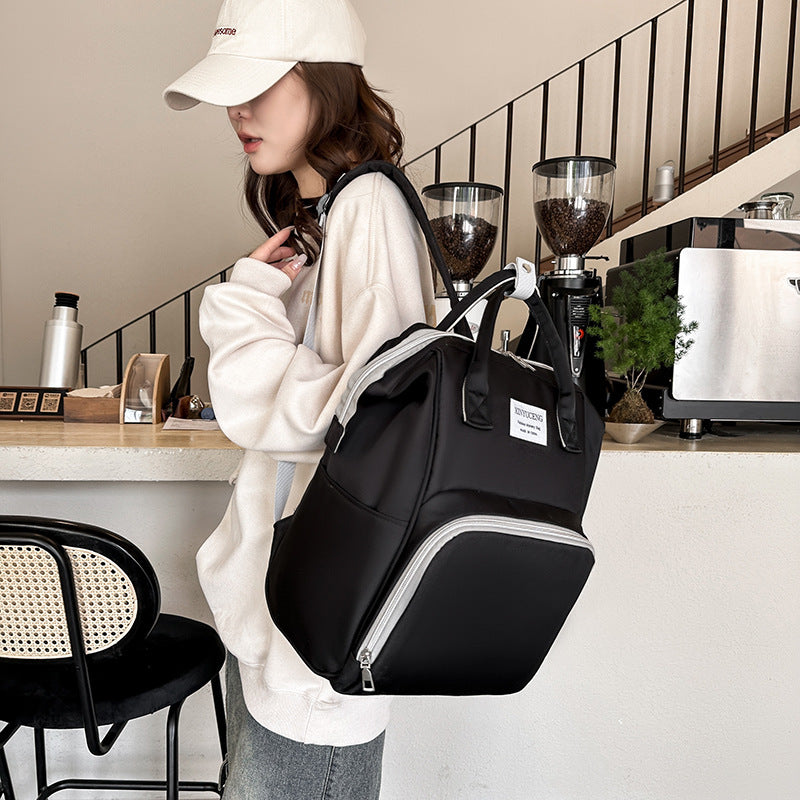 Versatile Backpack with Multi-Compartment Design Bowlift