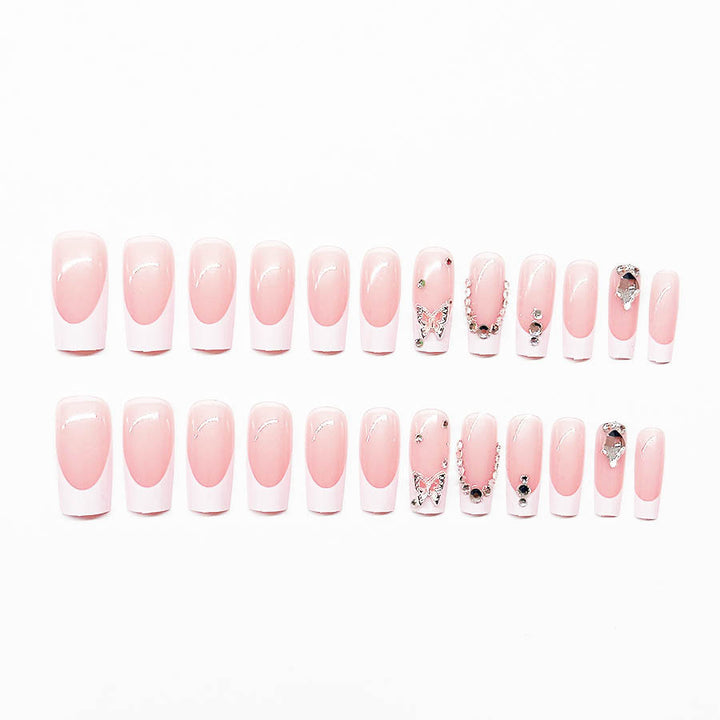 Acrylic nail set with elegant rhinestone and glitter decorations Bowlift