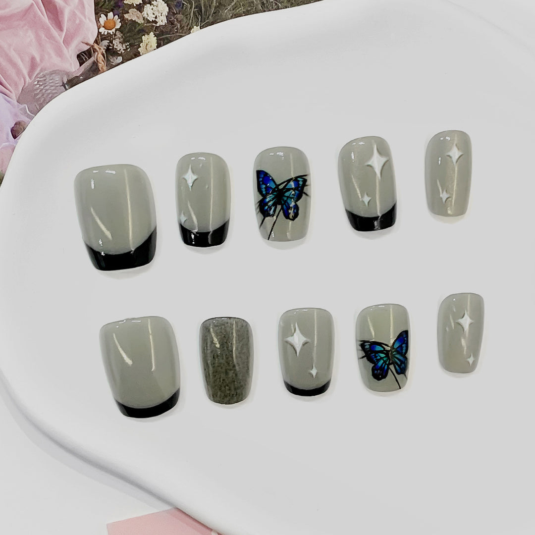 Artistic nail tips with butterfly designs Bowlift