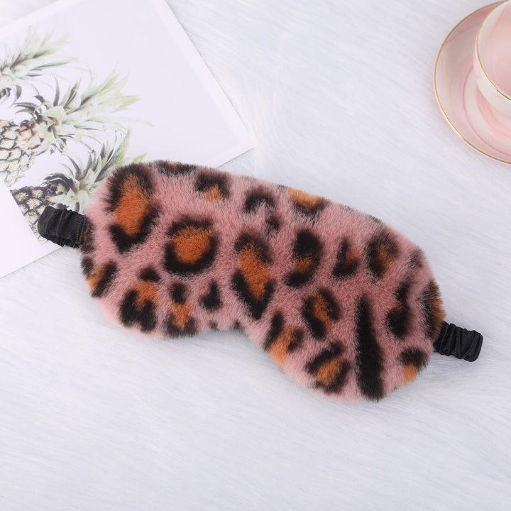 Women's cuddly faux fur sleep mask with heart-embossed surface and gathered comfort band Bowlift
