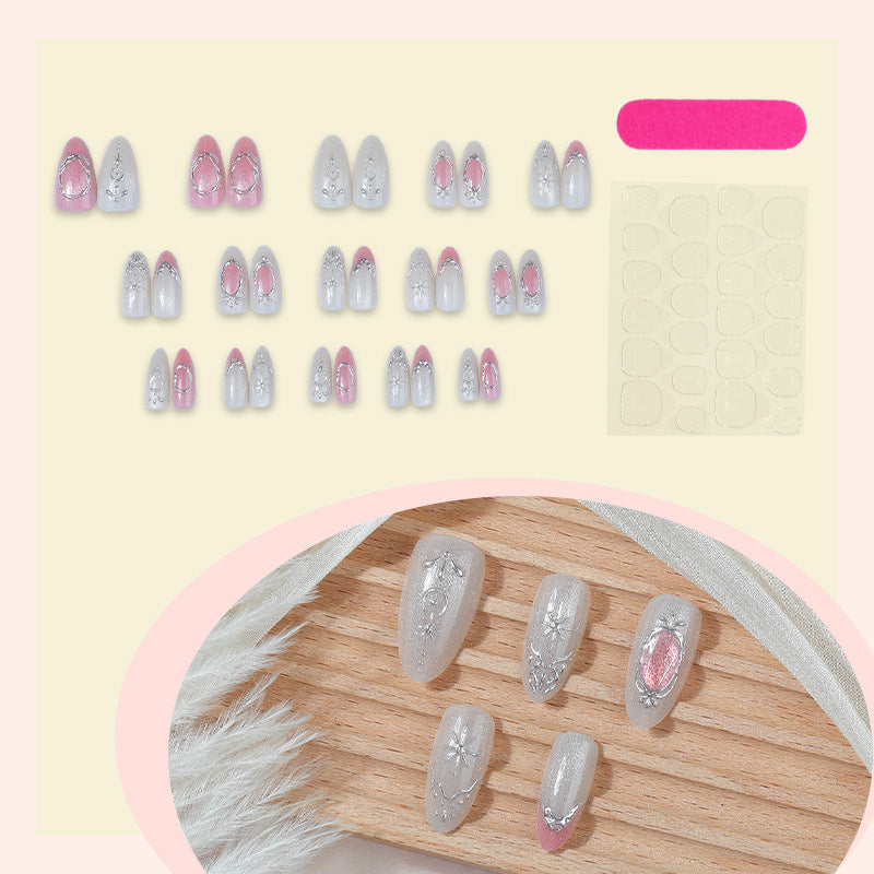 Artificial nail set with glamorous floral and metallic accents Bowlift