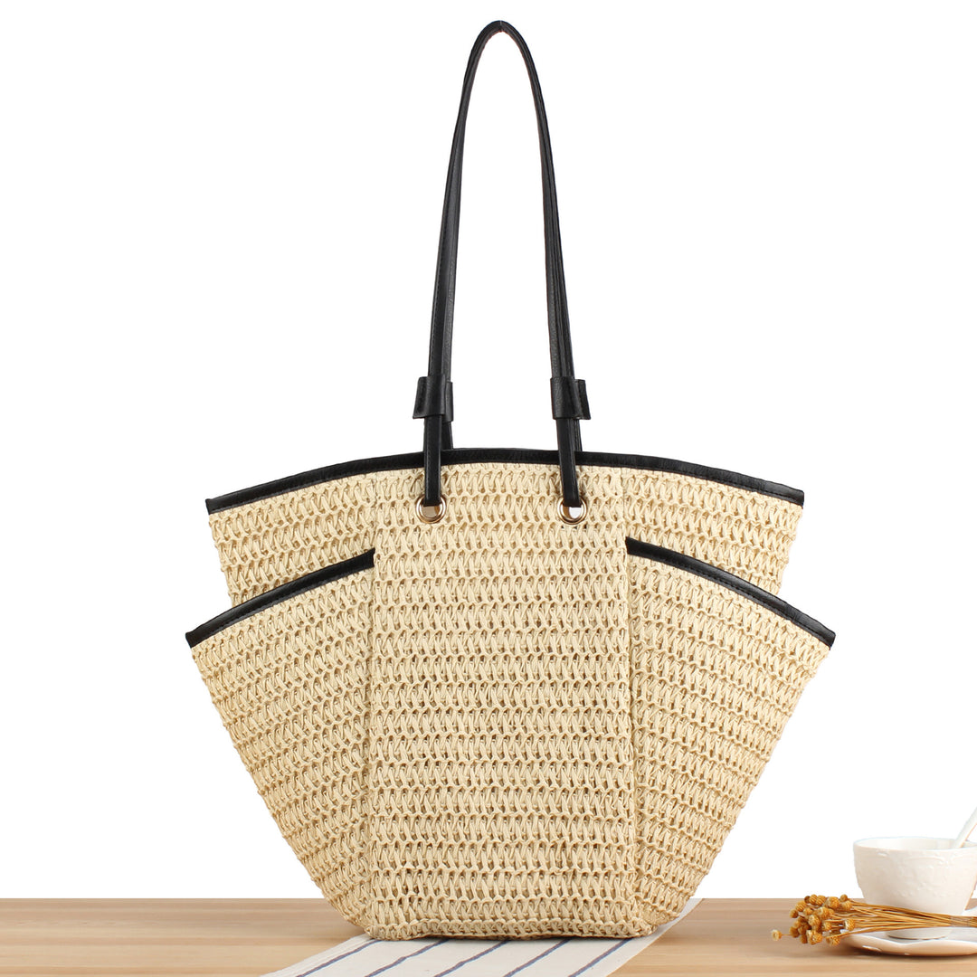 Tote bag with sophisticated compartment design and durable leather handles Bowlift