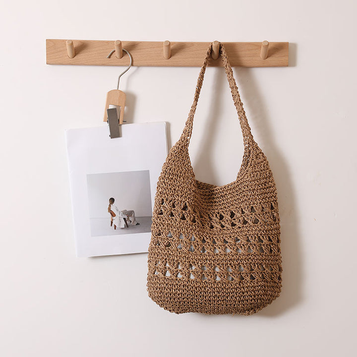 Crocheted shoulder bag with decorative hole pattern Bowlift