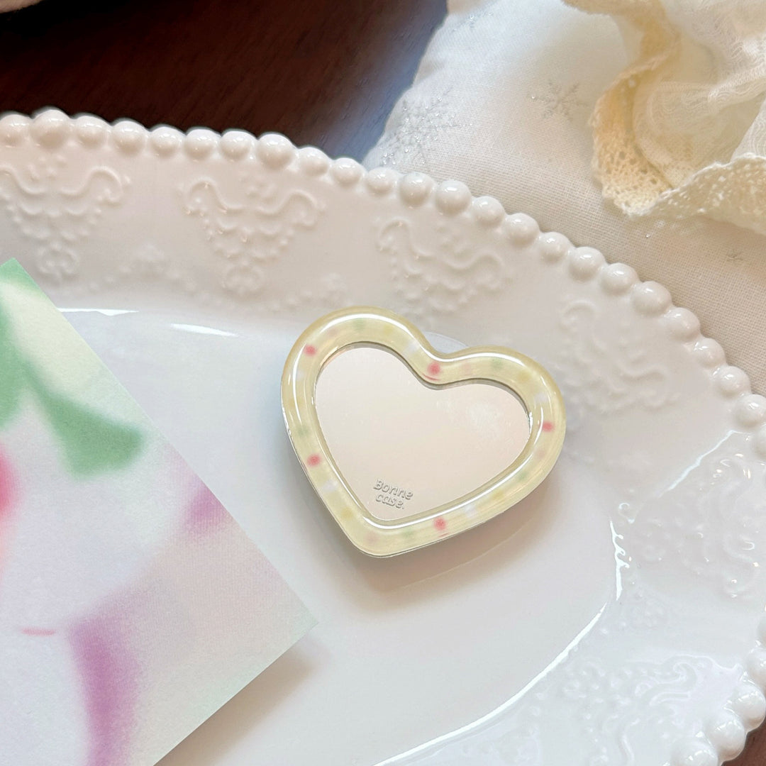 Hand mirror in heart-shaped design Bowlift