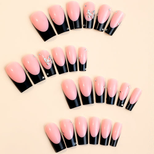 Acrylic nail set with elegant rhinestone details and modern designs Bowlift