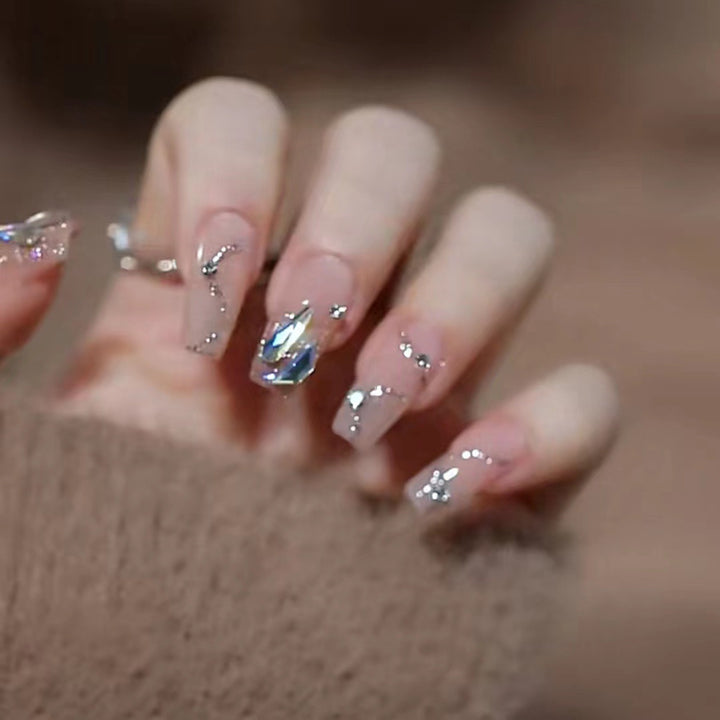 Glamorous artificial nails with glitter accents Bowlift