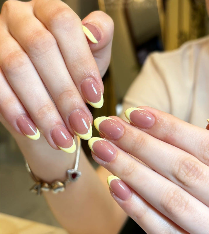 French Tip Press-On Nail Set with Decorative Yellow Accents Bowlift