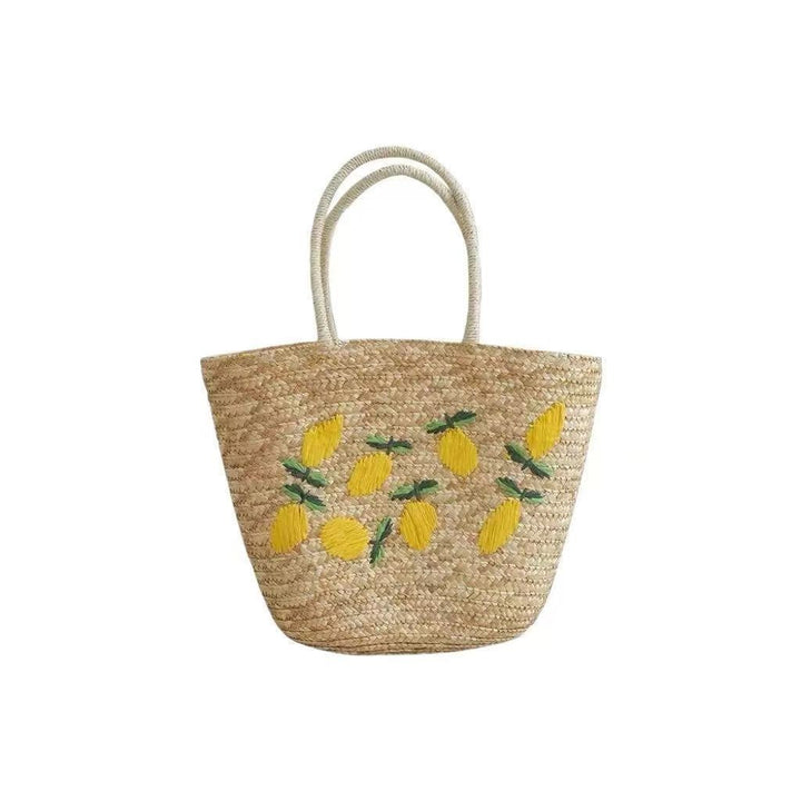 Spacious straw bag with lemon embroidery Bowlift