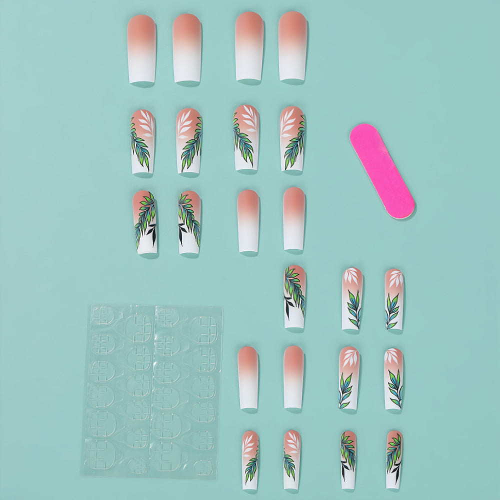 Artificial nails with elegant ombre design and floral accents Bowlift