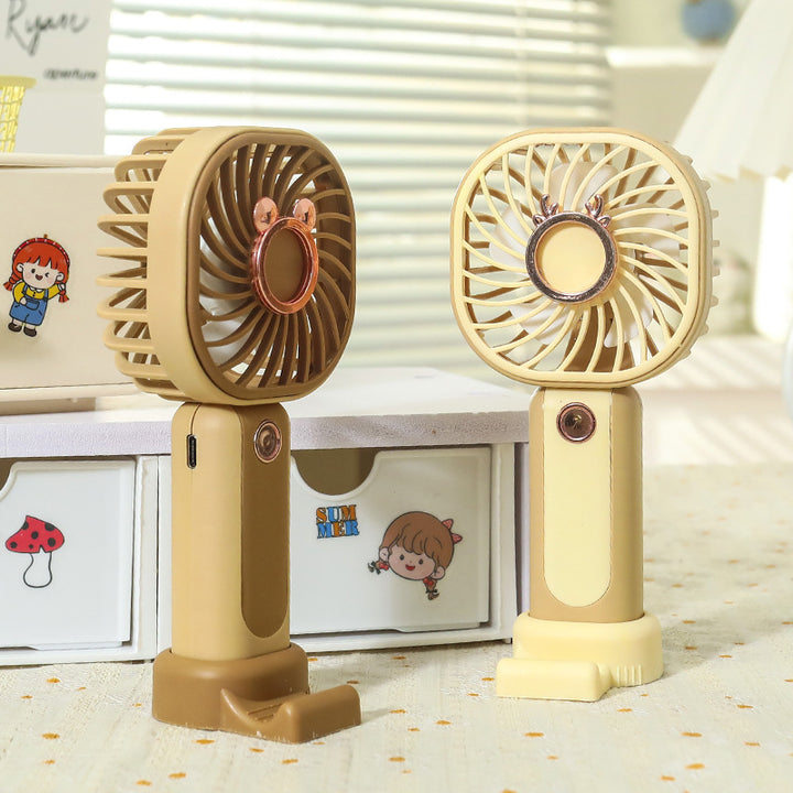 Women's portable mini hand fan with USB charging function and flexibly adjustable tilt angle Bowlift