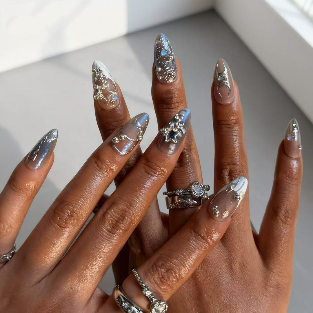 Artful Nail Extensions with Shiny Metal Accents Bowlift