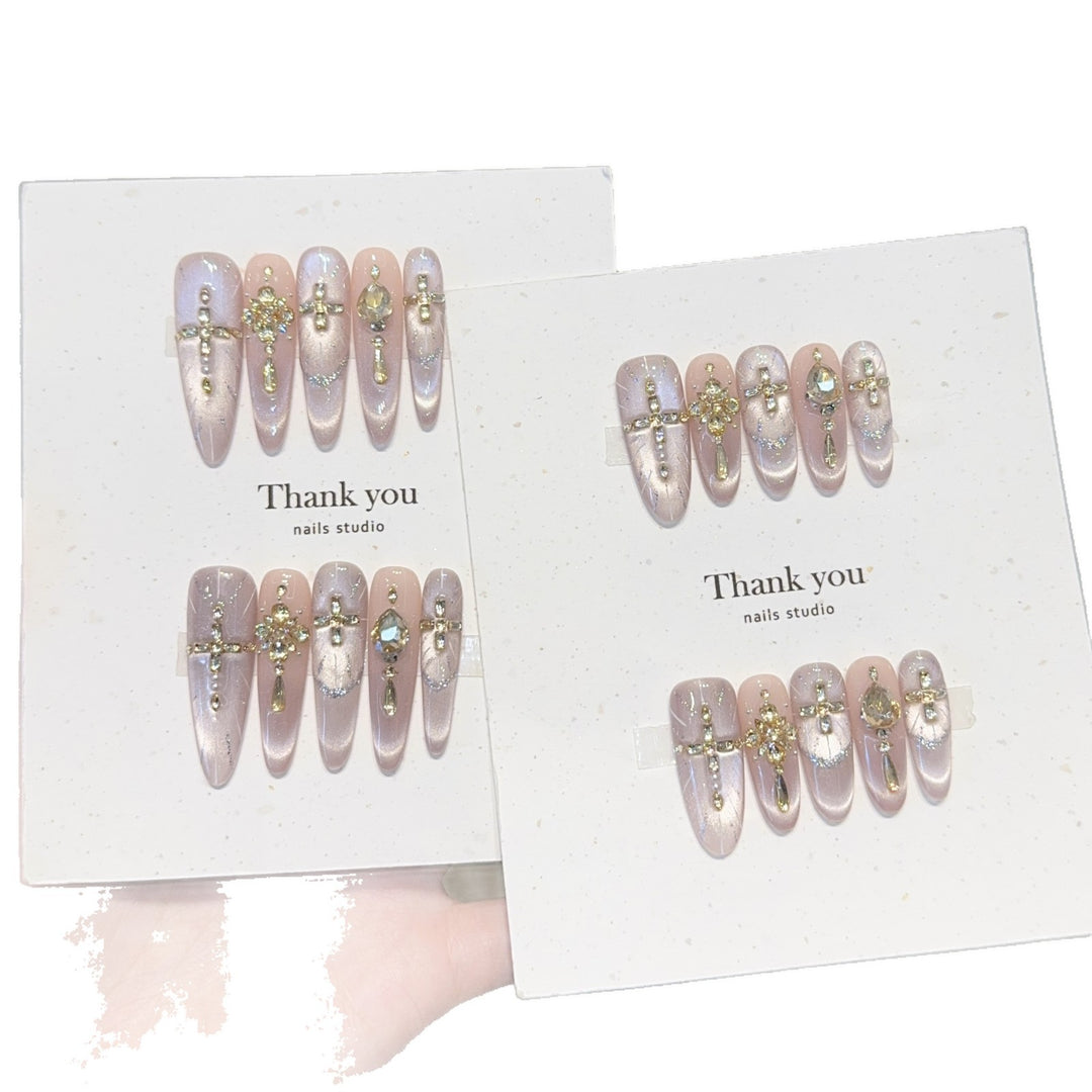 Artificial Nails in Elegant Gold Design Bowlift